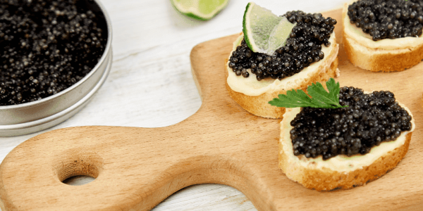 How is caviar extracted from a sturgeon?